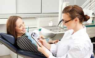 Dentist taking notes